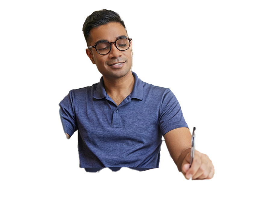 Man in blue shirt looking at a computer