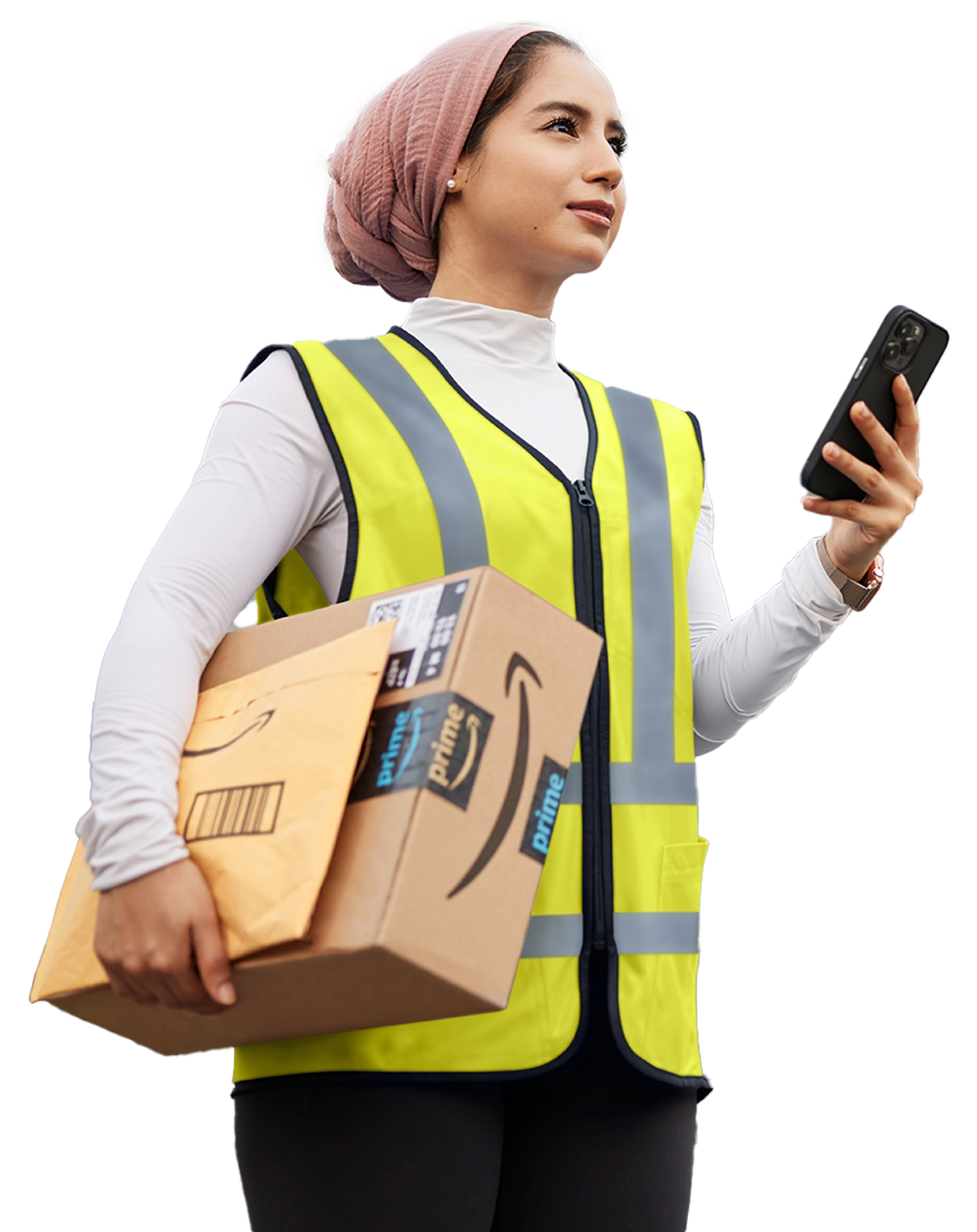 Delivery worker in safety vest holding Amazon package and smartphone, looking up while making a delivery