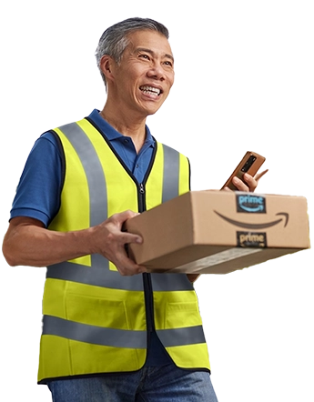 Delivery worker in safety vest holding Amazon package and scanning with phone
